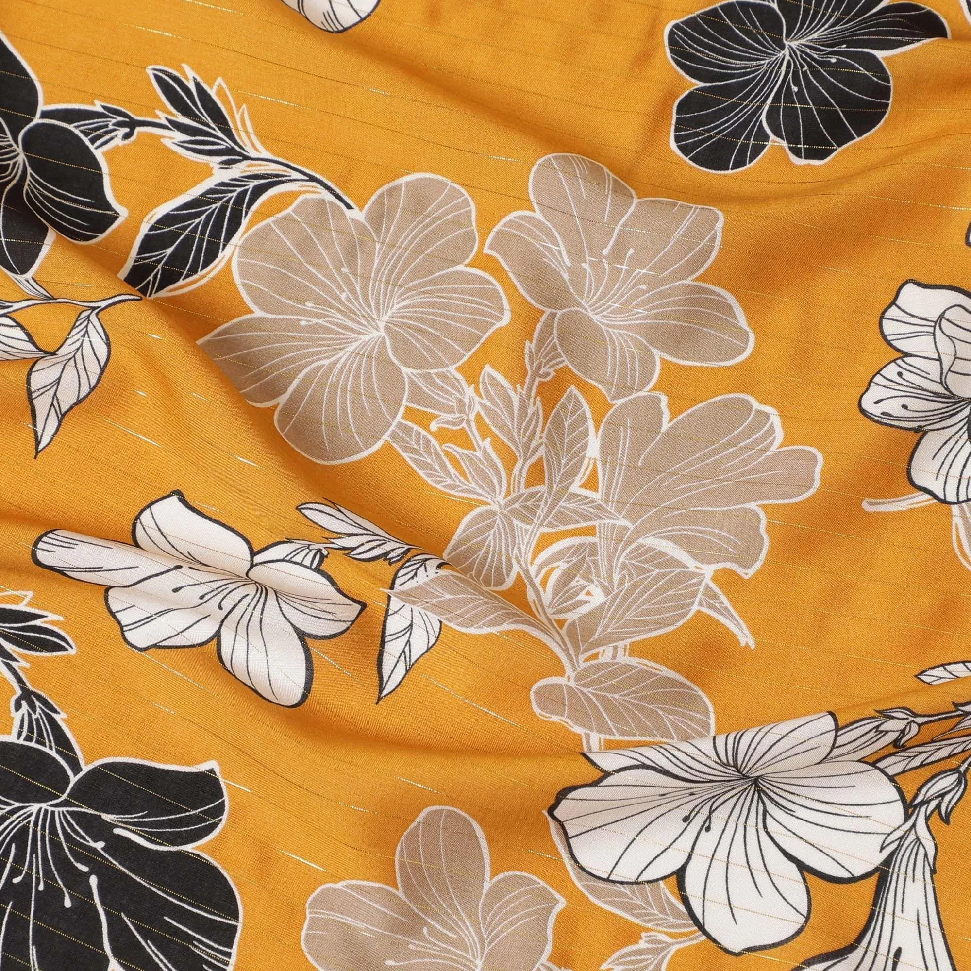 Mustard yellow Italian viscose fabric with black, pale brown and off white print having golden metallic lurex stripe in floral design-D7904